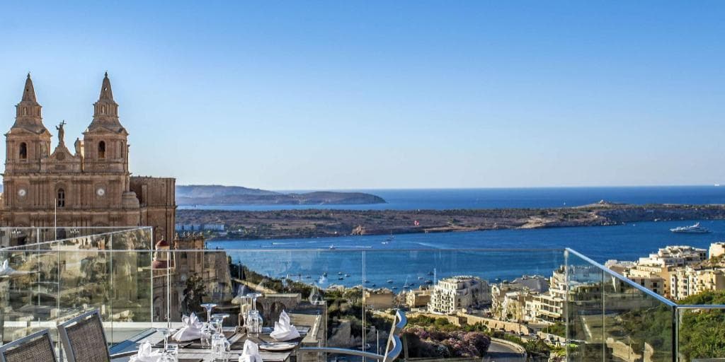 Maltese limestone architecture detail at luxury hotel — search: Malta limestone architecture luxury hotel detail