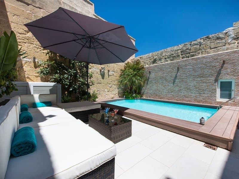 Deluxe garden room with private terrace and tropical garden Malta hotel — search: luxury hotel garden room private terrace Malta