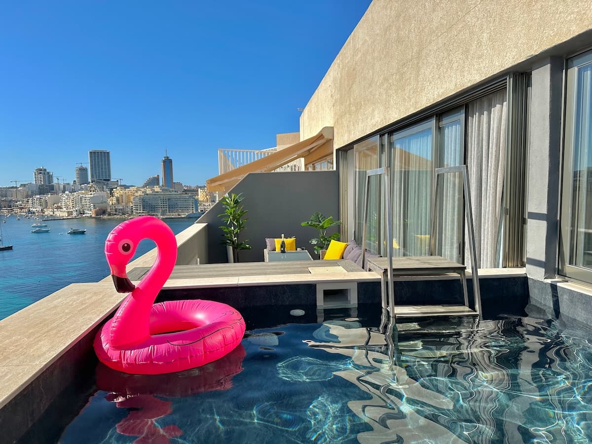 Presidential penthouse suite rooftop terrace private pool Malta — search: luxury penthouse suite rooftop pool Malta hotel