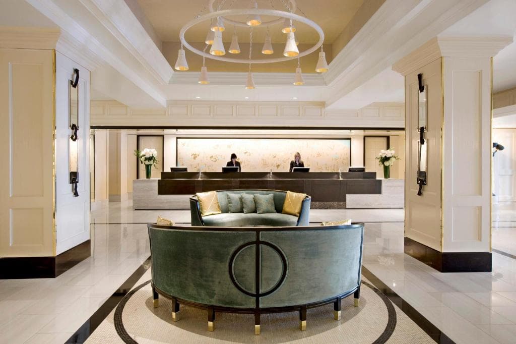 Hotel concierge desk elegant lobby marble — search: luxury hotel concierge desk elegant marble lobby