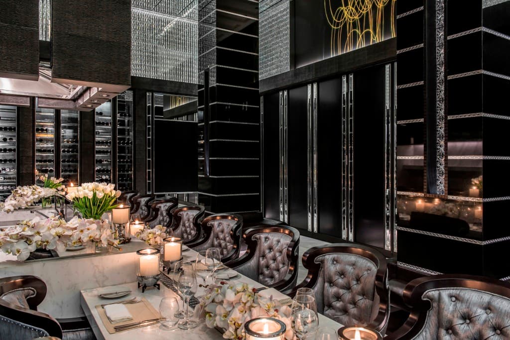 Private dining room luxury hotel with flowers candlelight intimate setting — search: private dining room luxury hotel flowers candlelight intimate elegant