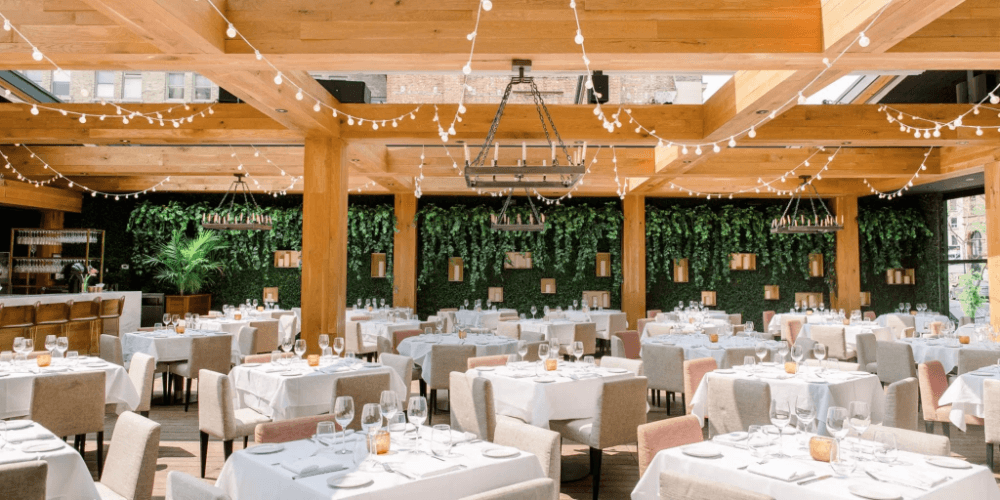 Fine dining restaurant with white tablecloths sea view chandeliers Malta luxury hotel — search: fine dining restaurant white tablecloths chandeliers sea view 5 star Malta