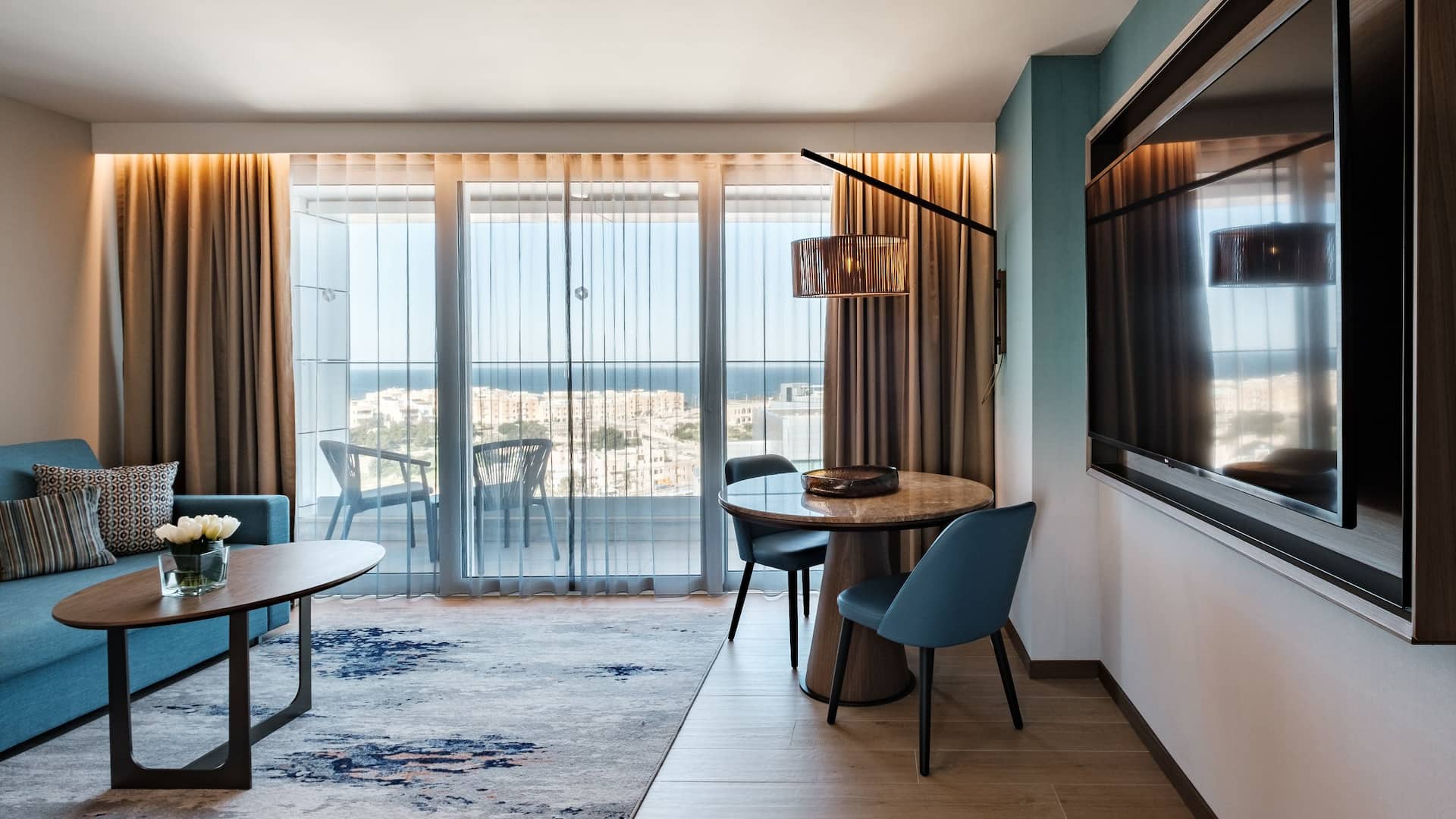 Luxury hotel suite interior with sea view and opulent furnishings Malta — search: luxury hotel suite interior opulent sea view Malta 5 star